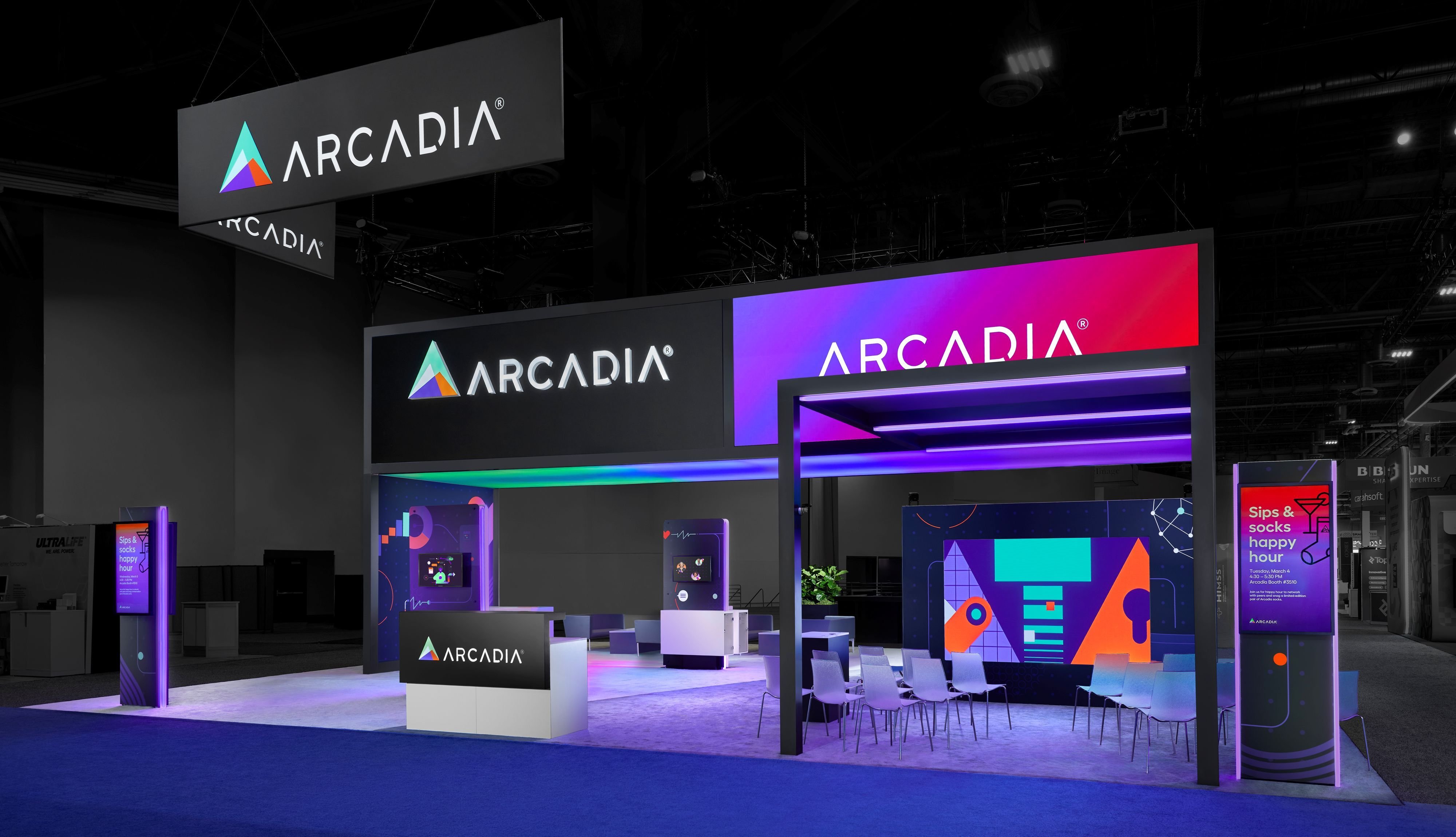 Large scale ASCO trade show exhibit featuring visual lighting audio visual