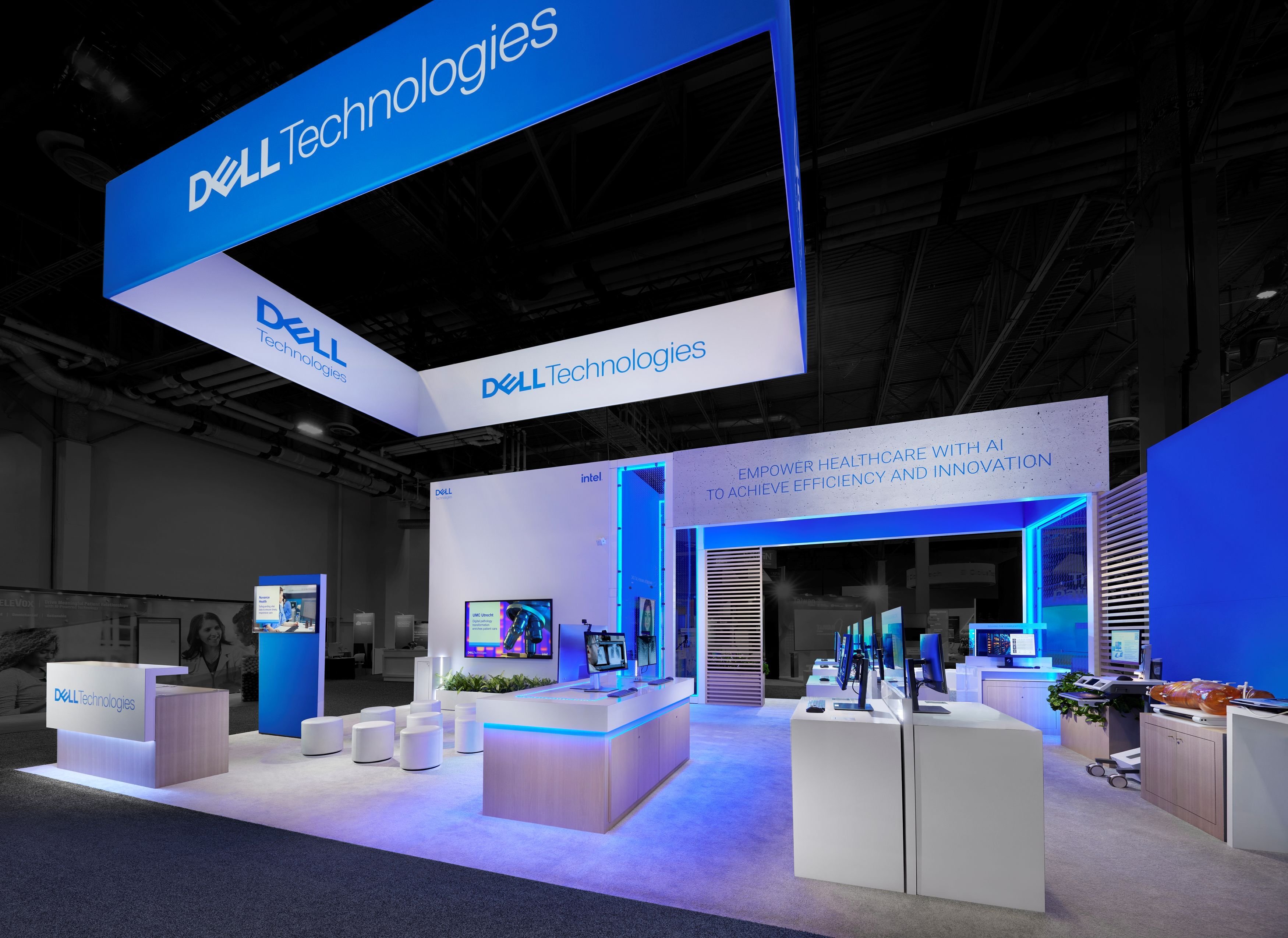 30x40 custom ASCO trade show booth for Corma featuring integrated audio visual and overhead branding