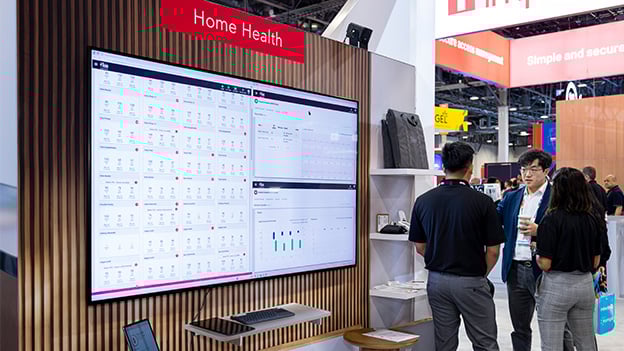 Masimo W1 Watch showcased in HIMSS trade show booth for wearable telehealth solutions