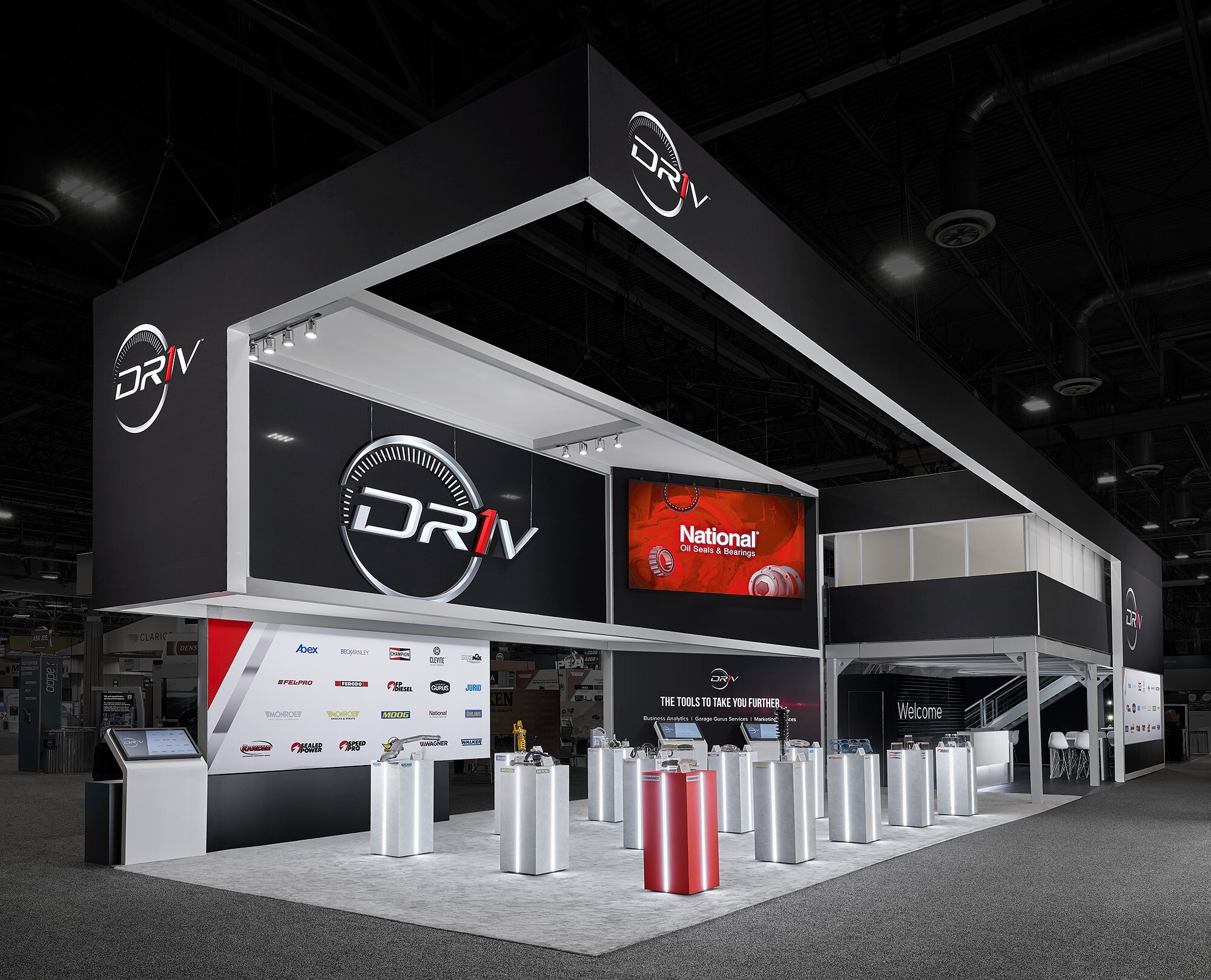 Large scale SEMA trade show exhibits featuring integrated brands and automotive