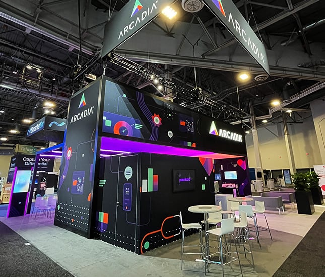 Arcadia HIMSS trade show booth with LED video wall, interactive healthcare demo stations, and brand-aligned digital design elements. Arcadia HIMSS trade show booth with LED video wall, interactive healthcare demo stations, and brand-aligned digital design elements.